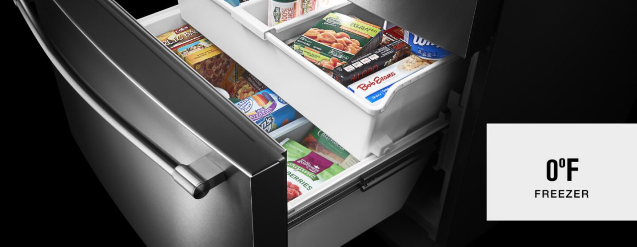 close up of open bottom drawer freezer with 0º temperature text close up of open bottom drawer freezer with 0º temperature text