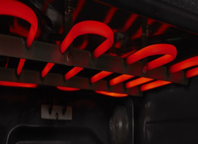 Red heating element in oven