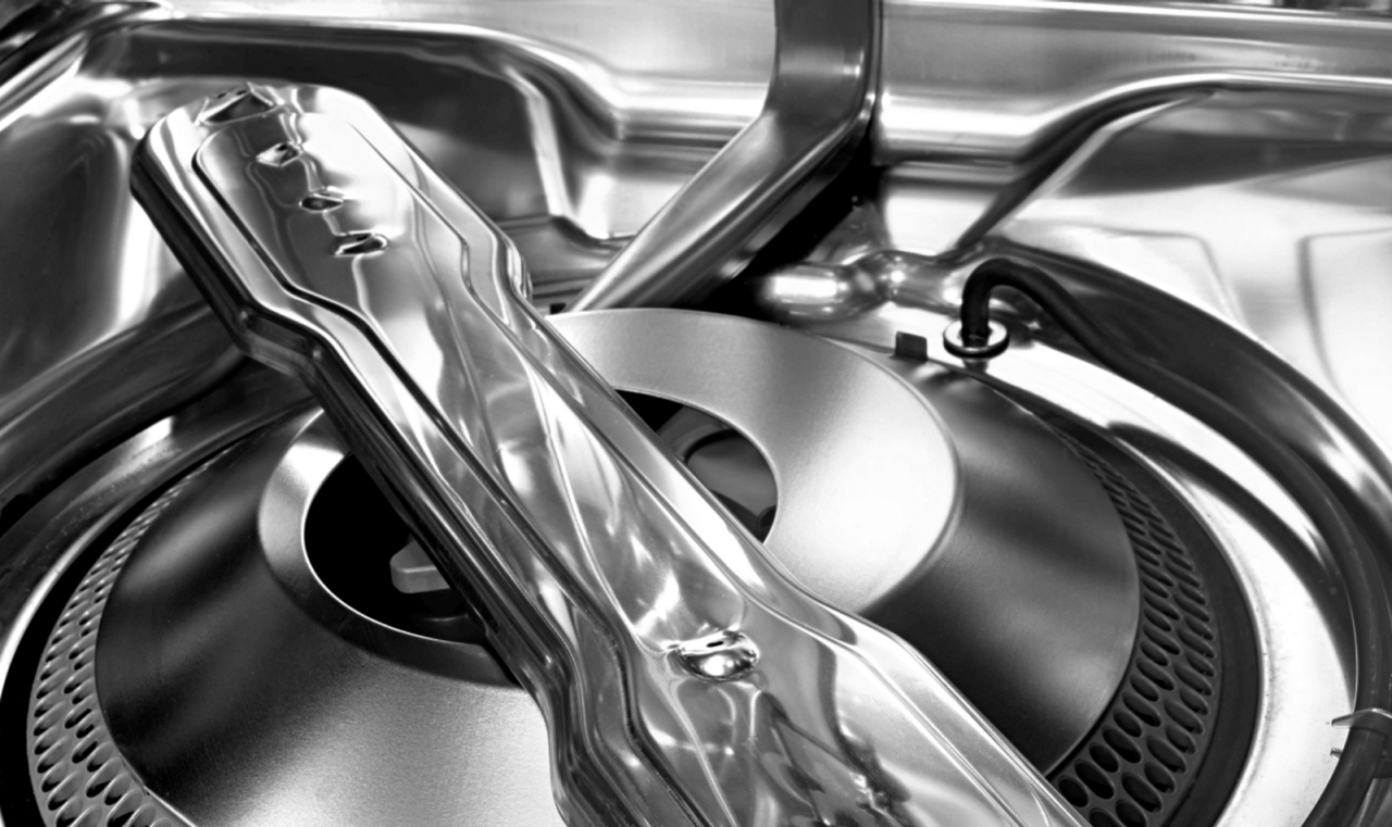 Spray arm of a stainless steel tub dishwasher