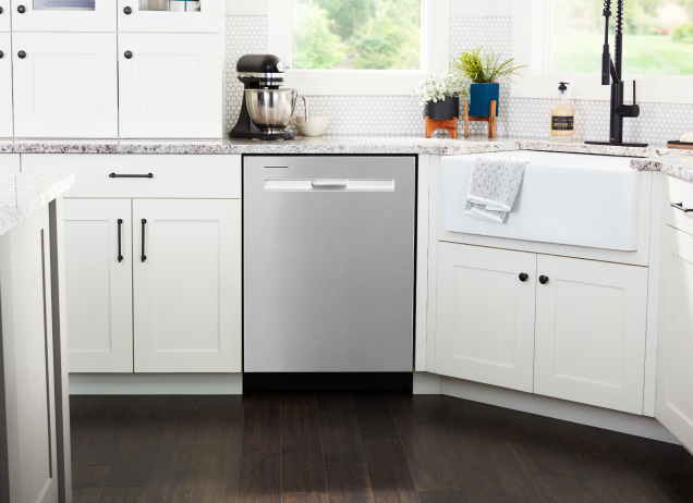 Dishwasher in a white kitchen. 