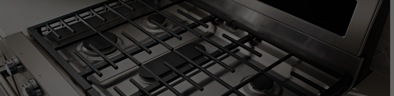 A close up image of stove grates on a gas range.