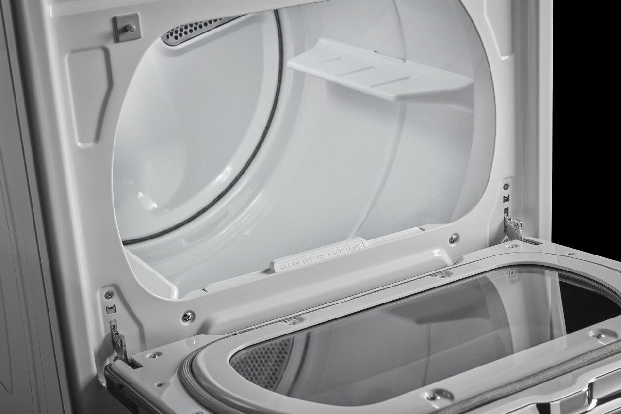 Maytag dryer with hamper door.