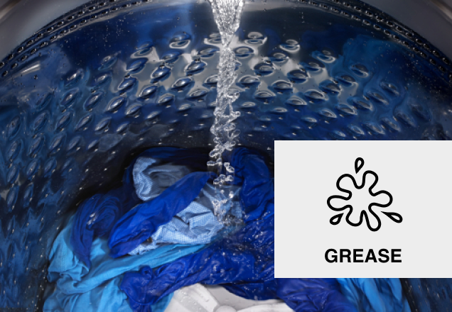 Water spraying into a washer tub. 