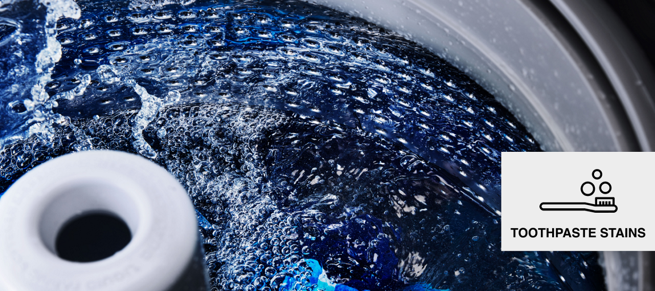 Water splashing in a Maytag® washing machine. Water splashing in a Maytag® washing machine.