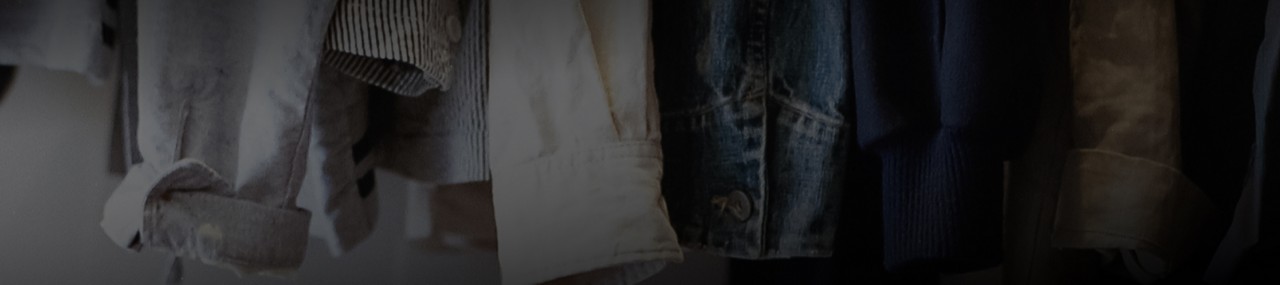 Close-up of several shirt sleeves.