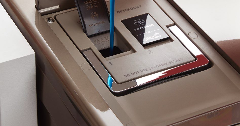 La distribution automatique de détergent et d'assouplissant La distribution automatique de détergent et d'assouplissant