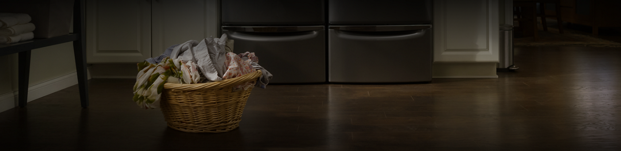 A laundry basket full of clothes.
