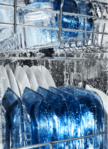 Dishes getting washed in a Maytag® dishwasher