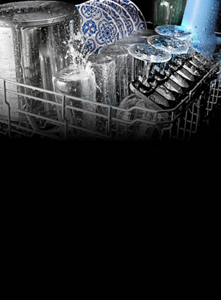 Glasses and plates being washed in a Maytag® dishwasher