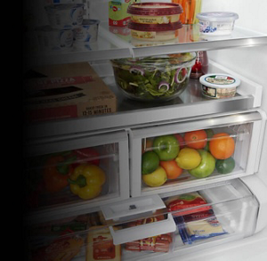 Crisper drawers full of produce and other foods